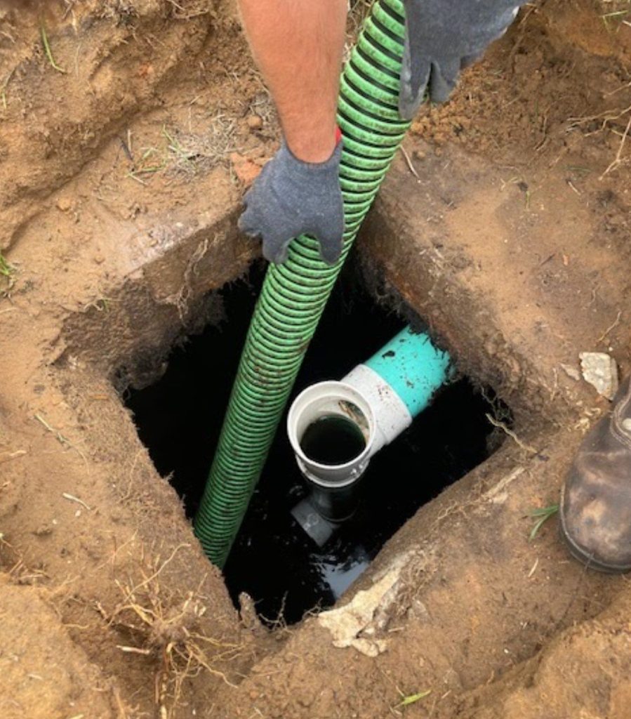 Anytime Septic performing a septic system inspection in Clermont, FL
